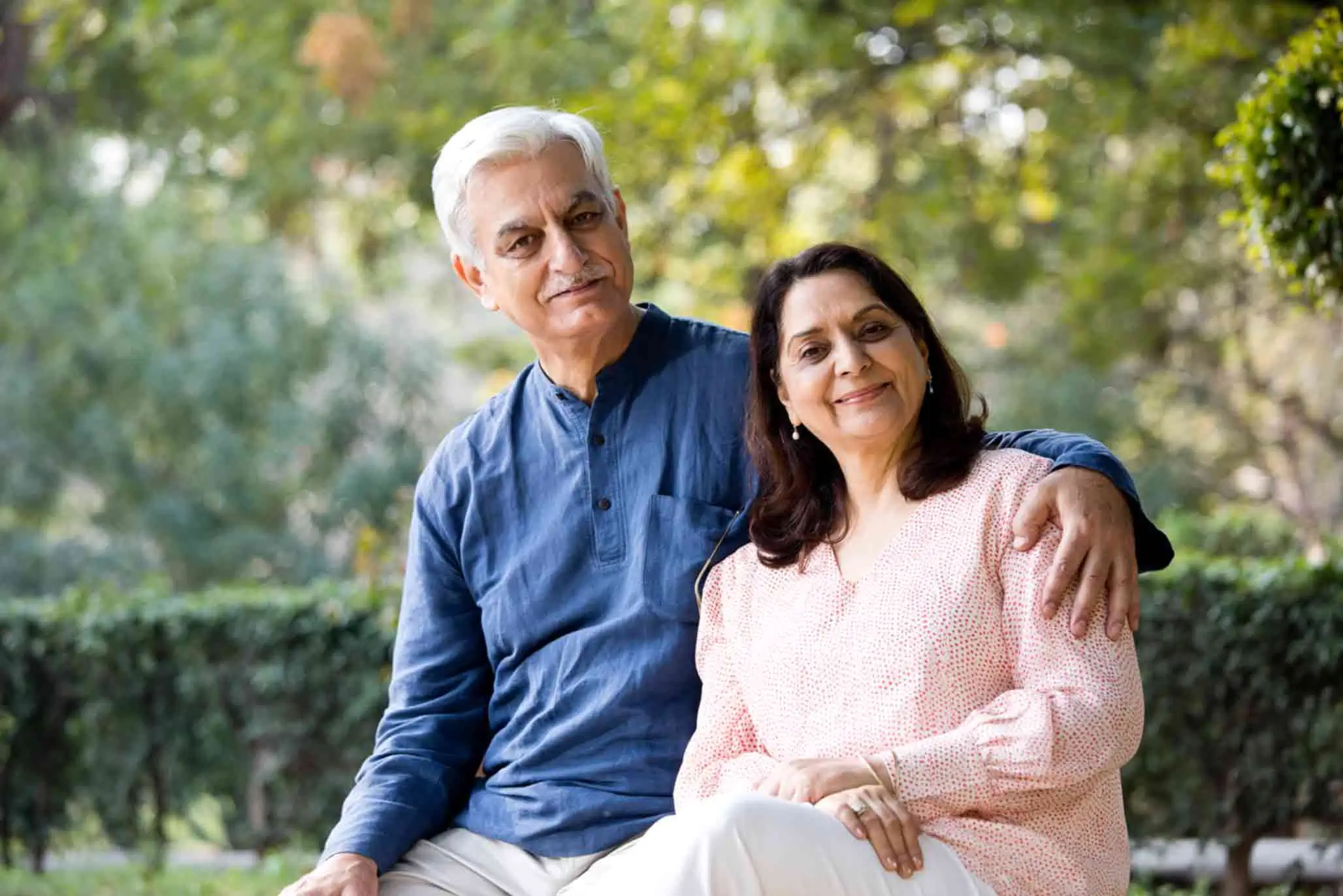 Senior couple smiling outdoors